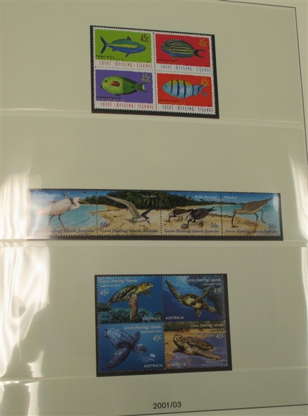 Cocos Islands Mint Collection in Lindner Album Pages to 2003 (Est $250-300)