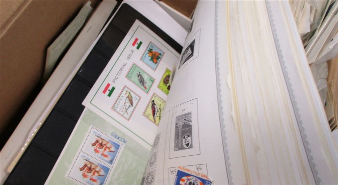 Box Filled with Stamps on Pages, Postcards, and Covers (Est $250-350)